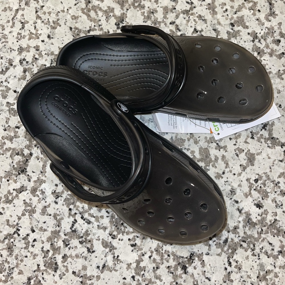 Women’s or Unisex Crocs.